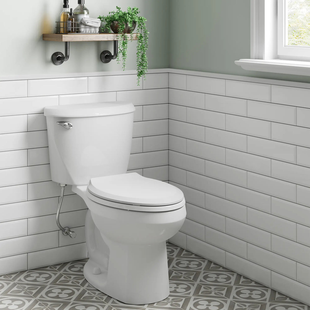 Reliant® Two-Piece Standard Height Elongated Toilet with Seat