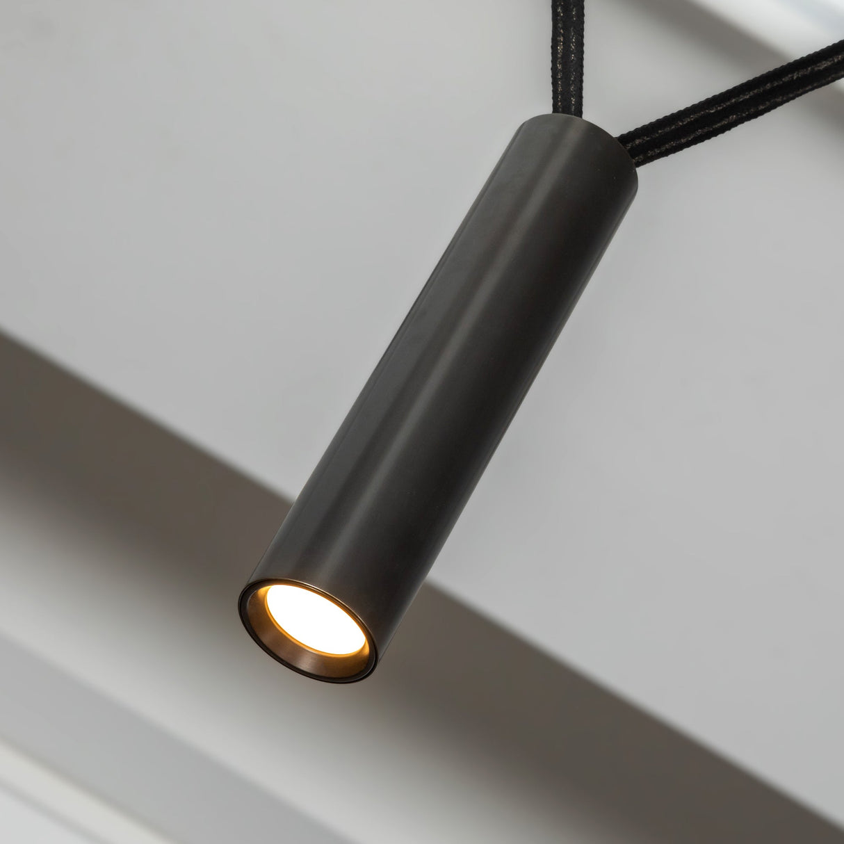 Kuzco Mason 4 Head Linear Pendant – Adjustable with Metal Strap Detail