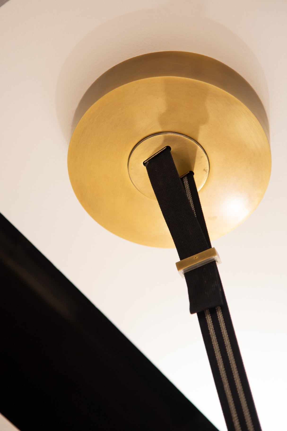 Kuzco Mason 4 Head Linear Pendant – Adjustable with Metal Strap Detail