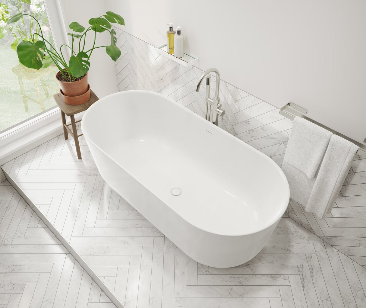 Malindi 67 x 30 Acrylic Freestanding Oval Center Drain Bathtub in White