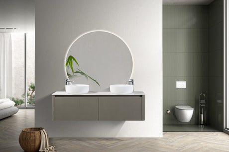Renovated modern condo bathroom with a wall-mounted vanity and glass walk-in shower