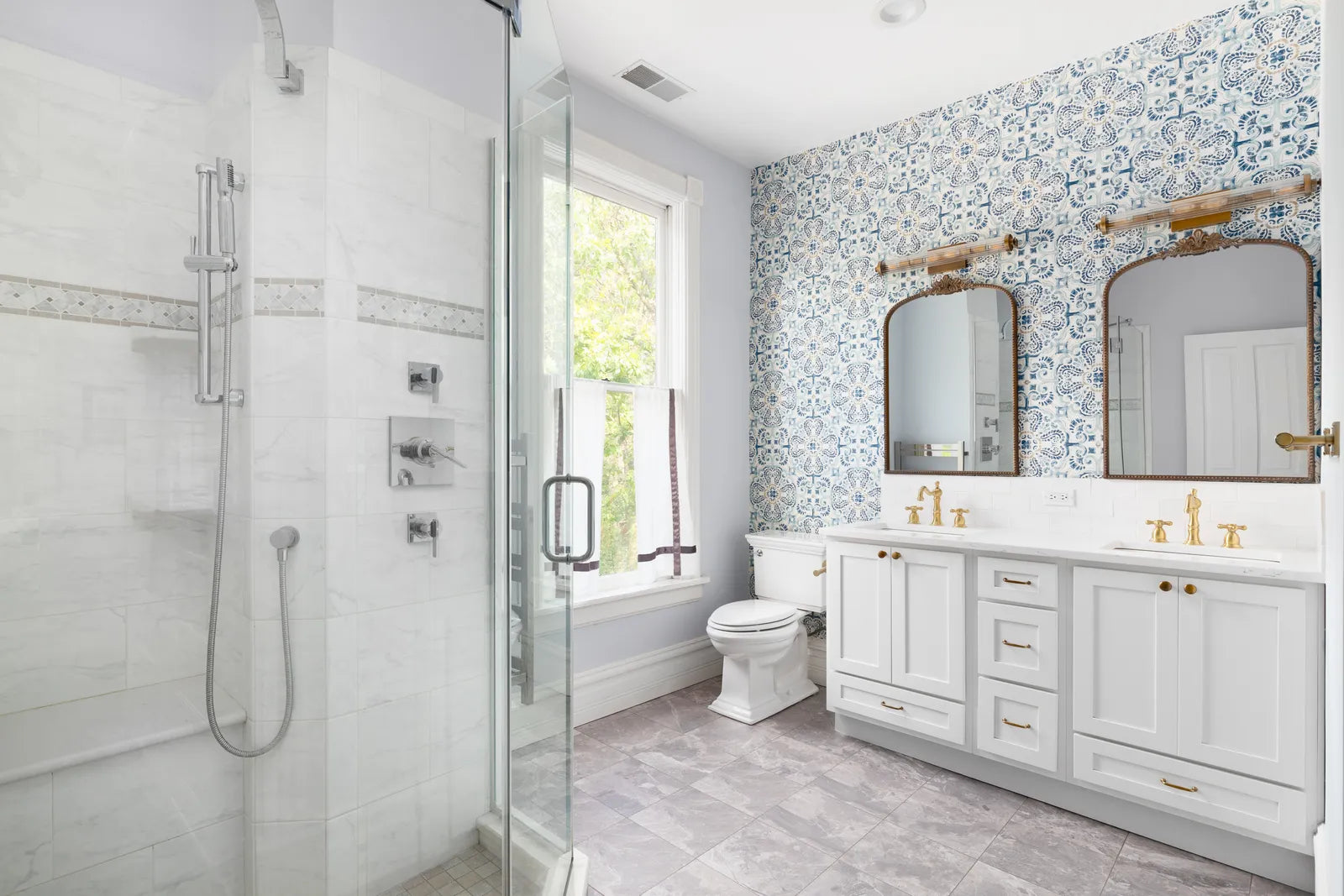 Converted alcove shower with a low-threshold base, white wall panels and a sliding glass door where a bathtub used to be