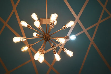 Modern multi-light chandelier hanging over a dining table in a contemporary Canadian home
