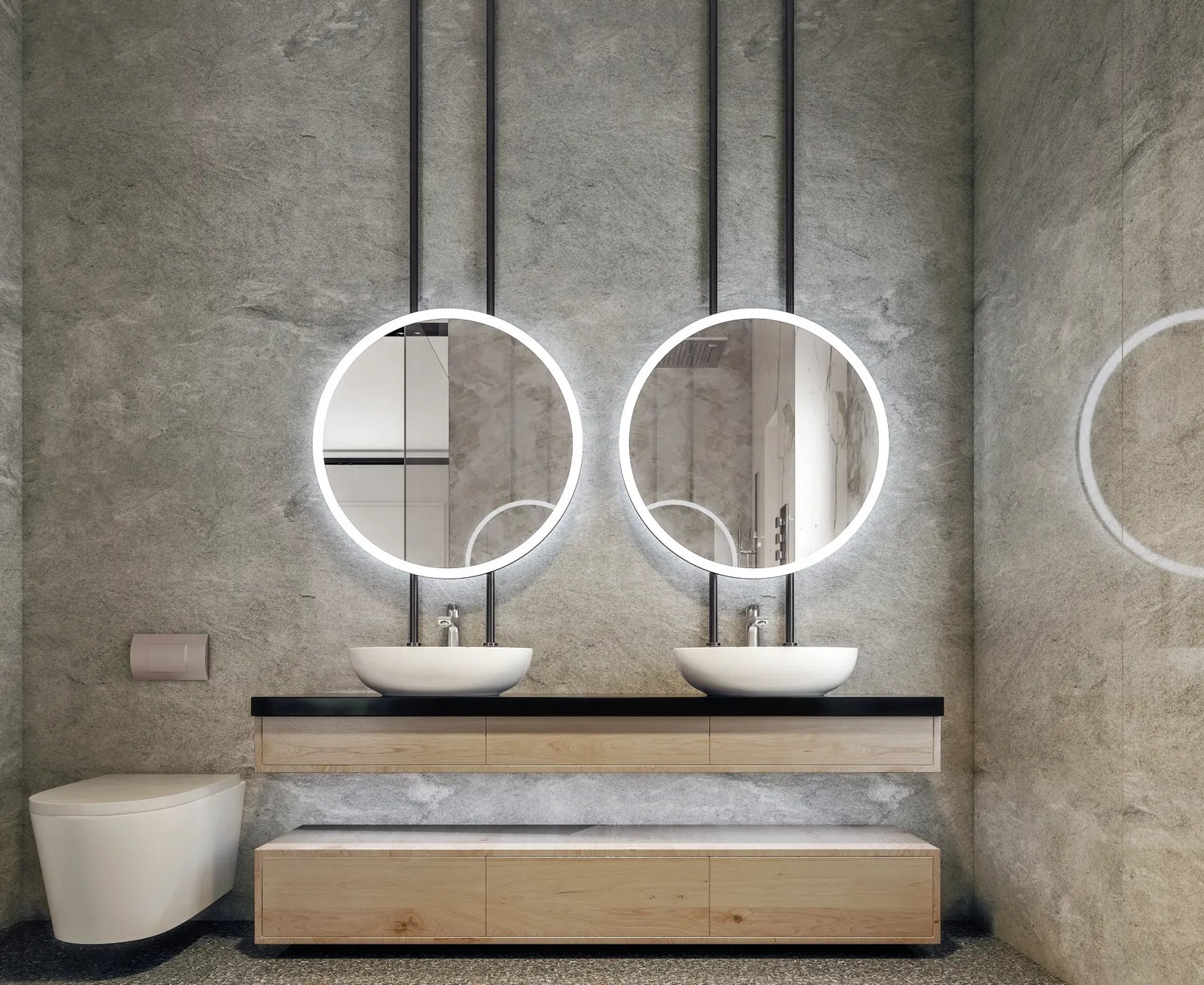 Round vessel sink sitting on a wood bathroom vanity counter with a tall single-hole faucet