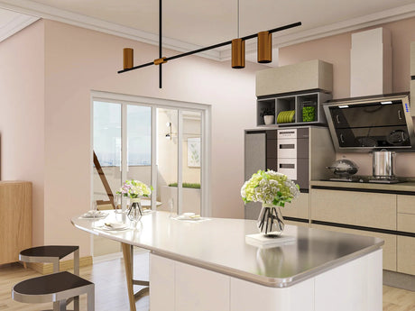 Contemporary kitchen island lit by a slim linear LED pendant fixture suspended above the counter