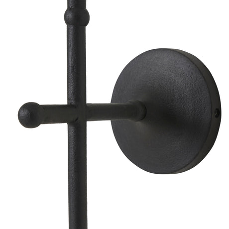 Close-up of the Kurosu wall sconce round backplate and textured stem