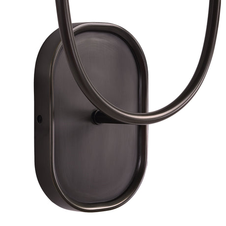 Close-up of the Megara wall sconce oval backplate and curved arm