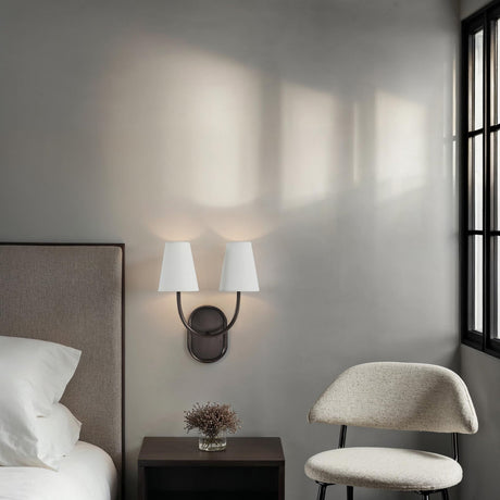 Renwil Megara 2-light wall sconce installed above a nightstand in a modern bedroom