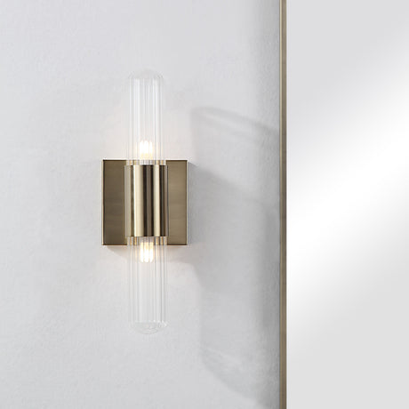 Renwil Chiara ribbed wall sconce installed on a wall beside a mirror