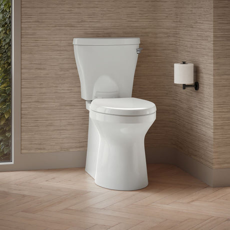 Betello® Two-piece elongated toilet with skirted trapway, 1.28 gpf