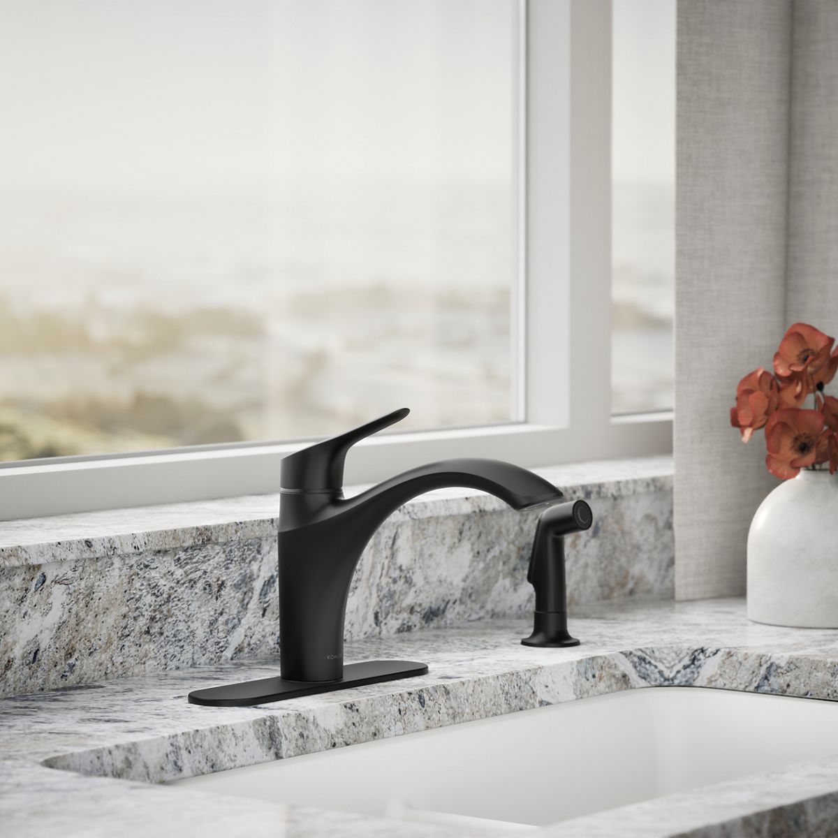 Rival® Single-handle kitchen sink faucet with side sprayer