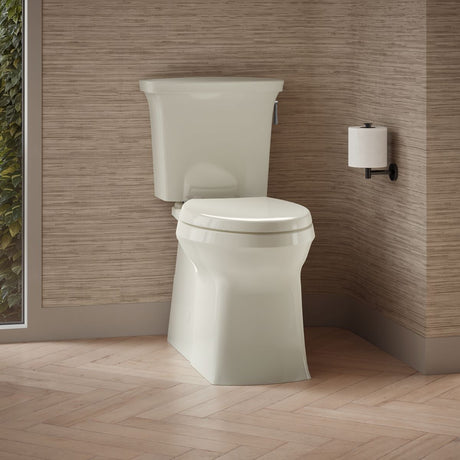 Corbelle® Two-piece elongated toilet with skirted trapway, 1.28 gpf