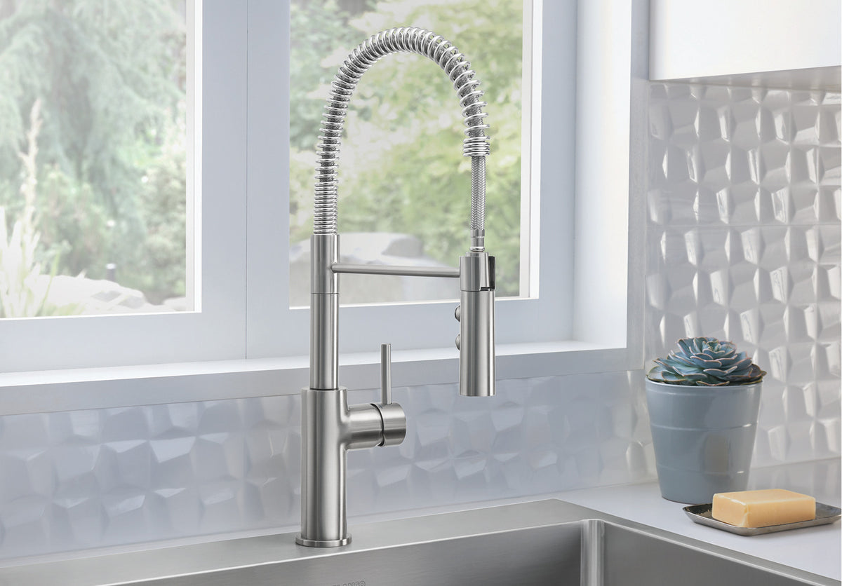 Blanco Catris Semi-Pro Faucet installed in a bright, modern kitchen—PVD Steel finish