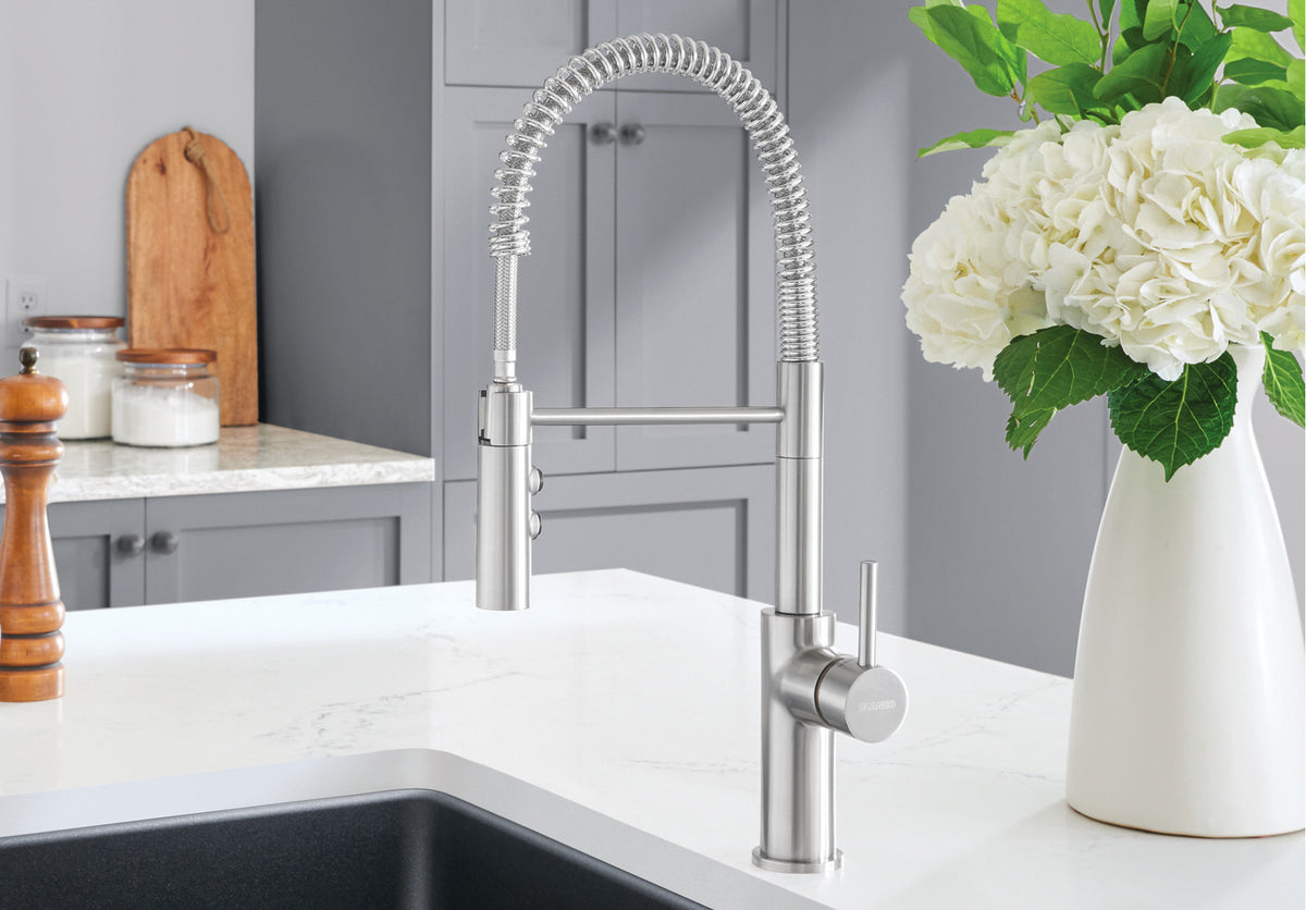 Blanco Catris Semi-Pro Faucet installed in a bright, modern kitchen—PVD Steel finish