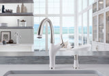 Blanco Artona Pull-Out Faucet and soap dispenser installed in a bright, transitional kitchen over a matching sink basin—White finish