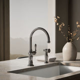 Artifacts® Single-handle kitchen sink faucet with two-function sprayhead