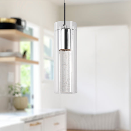 Kuzco Champagne 4-inch LED pendant with crystal bubbles in a glass shade, hanging in a modern kitchen
