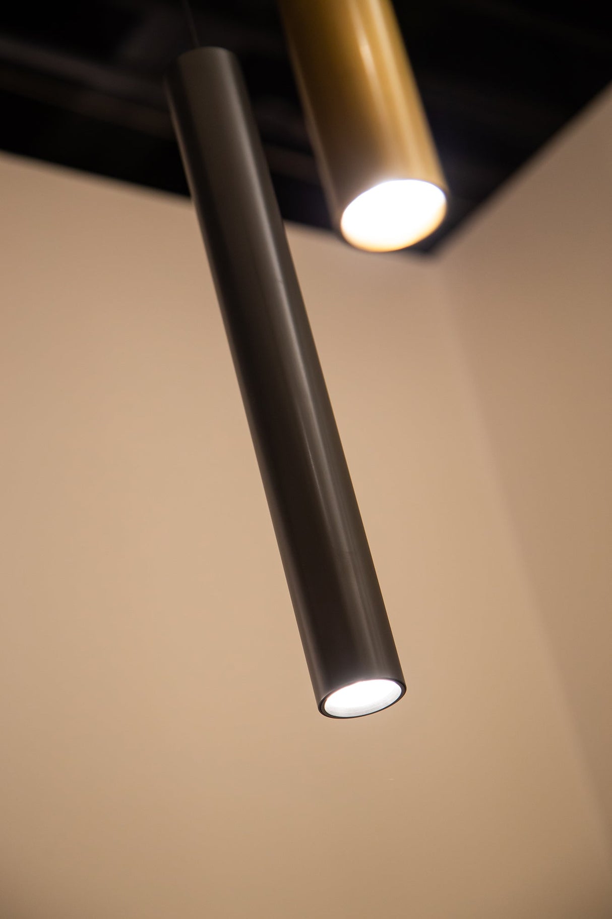 Kuzco Mason 4 Head Linear Pendant – Adjustable with Metal Strap Detail