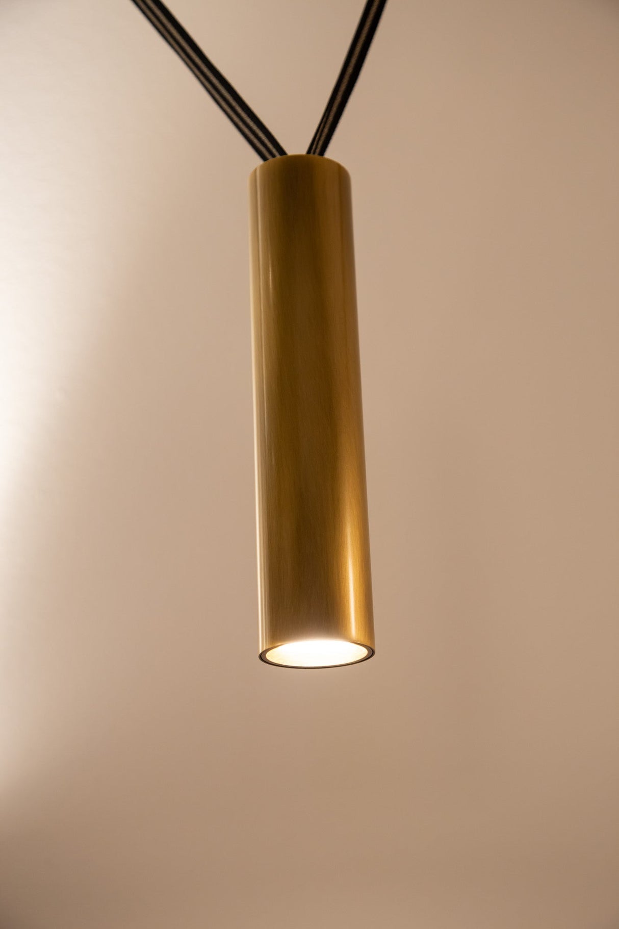 Kuzco Mason 4 Head Linear Pendant – Adjustable with Metal Strap Detail