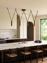 Kuzco Mason 4 Head Linear Pendant – Adjustable with Metal Strap Detail