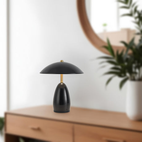 Poppy 9-inch table lamp in Glossy Black on a dresser in a room setting