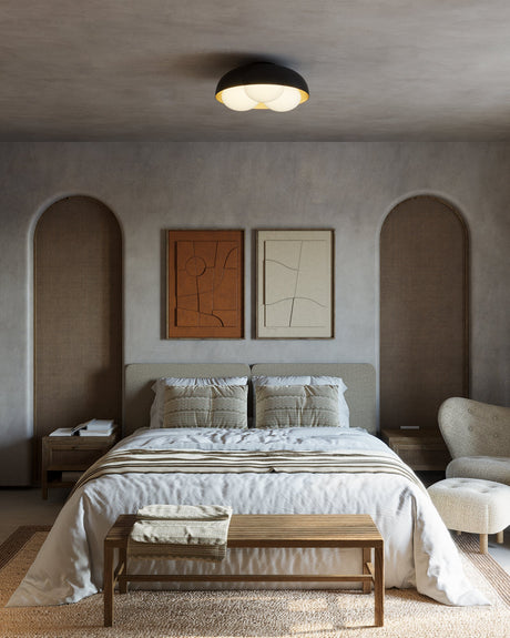 Alora Mood Robyn 16-inch flush mount in Matte Black installed on the ceiling of a bedroom