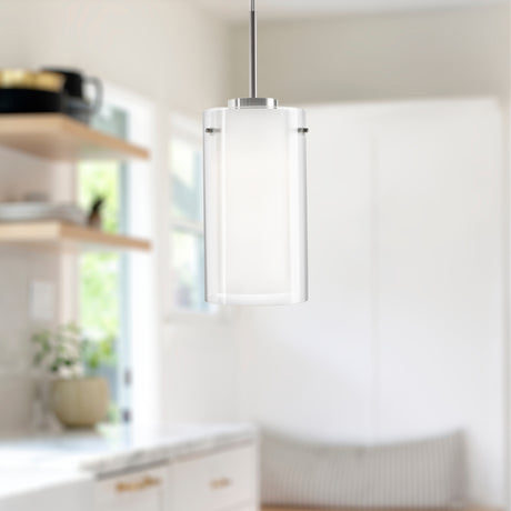 Kuzco Verona 12-inch LED pendant with cylindrical glass shade and inner diffuser, hanging in a modern kitchen